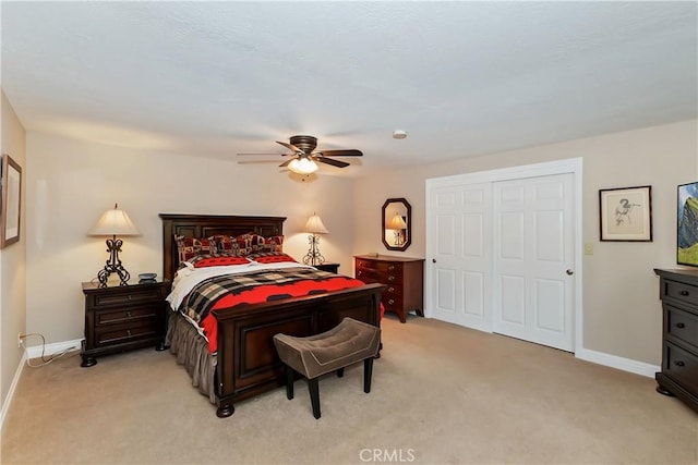 27844 Greenway Dr, Lake Arrowhead, CA 92352 - bedroom featuring light colored carpet, baseboards, a ceiling fan, and a closet