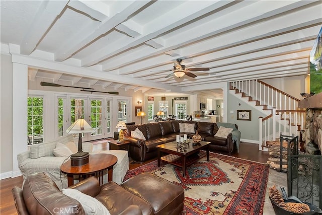 27844 Greenway Dr, Lake Arrowhead, CA 92352 - living room featuring wood finished floors, baseboards, stairs, beamed ceiling, and ceiling fan