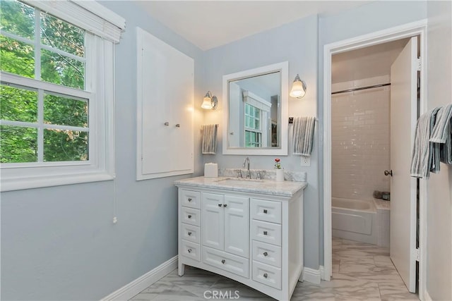 27844 Greenway Dr, Lake Arrowhead, CA 92352 - bathroom with marble finish floors, baseboards, vanity, and  shower combination