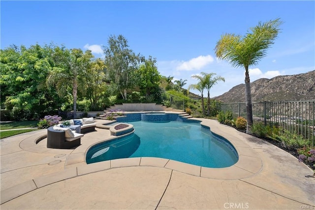 25865 Tulip Grove St, Stevenson Ranch, CA 91381 - view of pool with a mountain view, a patio, and a pool with connected hot tub