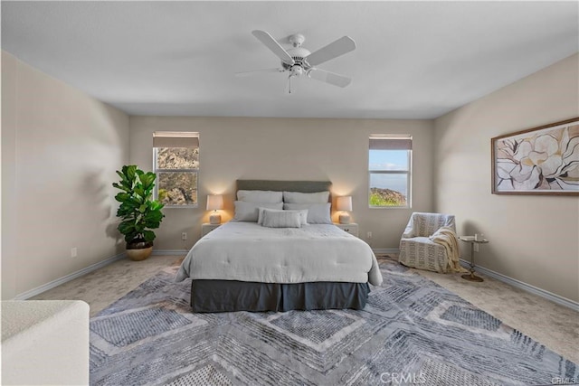 25865 Tulip Grove St, Stevenson Ranch, CA 91381 - bedroom featuring multiple windows, carpet, and a ceiling fan