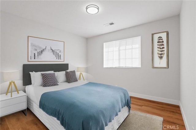 14118 Orizaba Ave Unit 7, Paramount, CA 90723 - bedroom with baseboards and wood finished floors