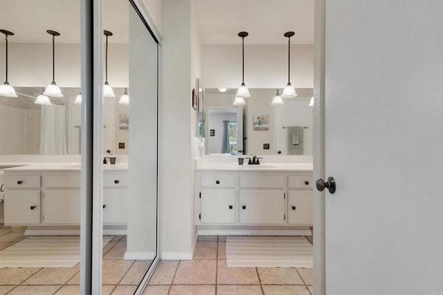 7488 Altiva Pl, Carlsbad, CA 92009 - bathroom with tile patterned flooring and vanity