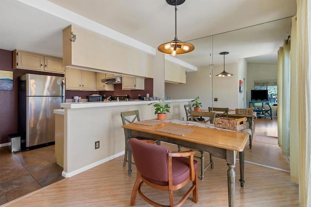 7488 Altiva Pl, Carlsbad, CA 92009 - dining space featuring light wood-style floors and baseboards