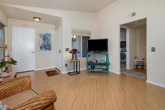 7488 Altiva Pl, Carlsbad, CA 92009 - living area with wood finished floors and baseboards