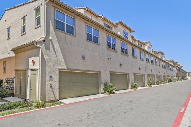 view of property featuring a garage