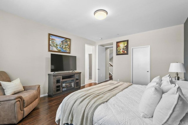 1310 Santa Liza Ave Unit 8, Chula Vista, CA 91913 - bedroom featuring dark wood-style flooring and baseboards