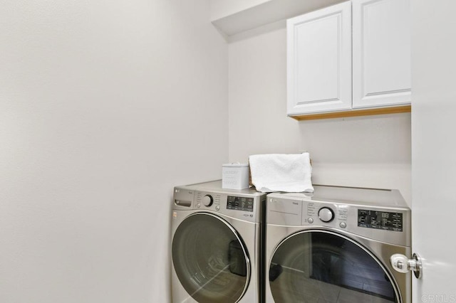 1310 Santa Liza Ave Unit 8, Chula Vista, CA 91913 - laundry area featuring washing machine and dryer and cabinet space