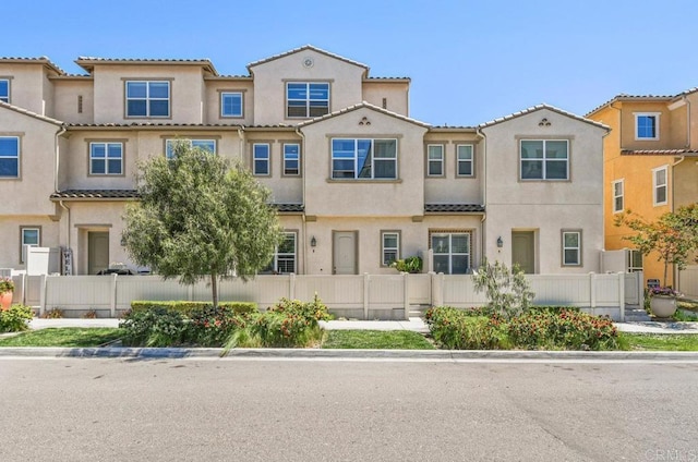 1310 Santa Liza Ave Unit 8, Chula Vista, CA 91913 - view of front of home with stucco siding and a tiled roof