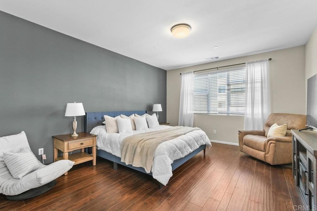 1310 Santa Liza Ave Unit 8, Chula Vista, CA 91913 - bedroom featuring dark wood-type flooring and baseboards