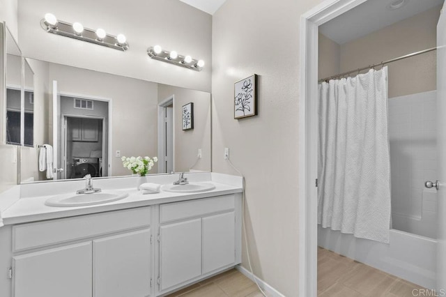 1310 Santa Liza Ave Unit 8, Chula Vista, CA 91913 - bathroom with double vanity and shower / bathtub combination with curtain