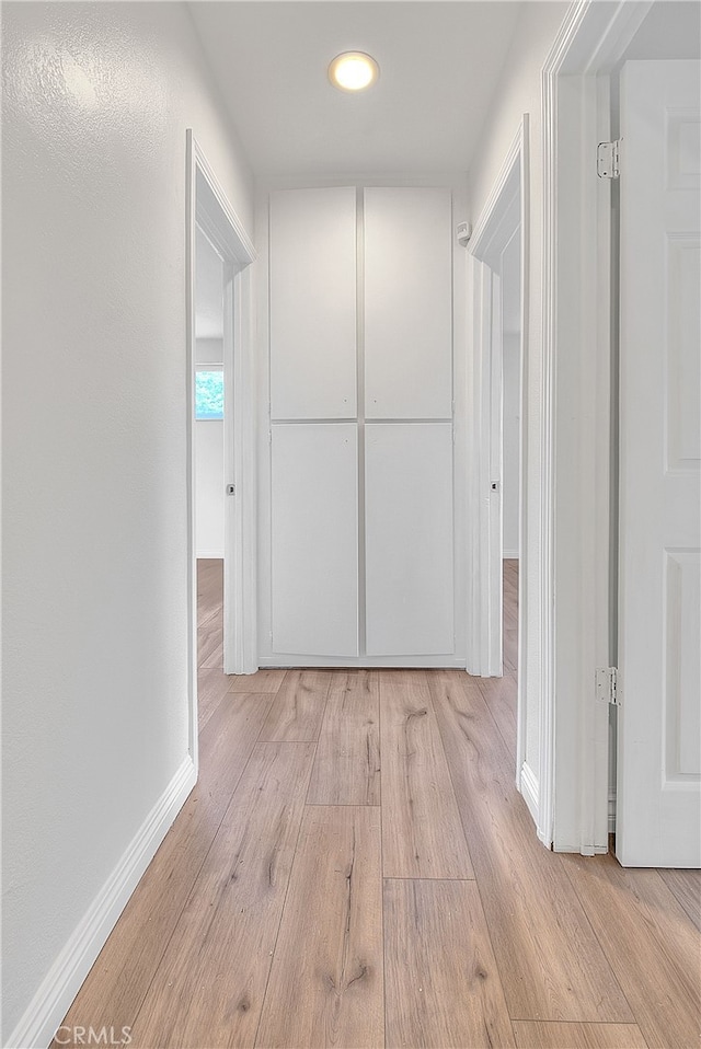 914 Lidford Ave, La Puente, CA 91744 - corridor with wood finished floors, baseboards, and recessed lighting