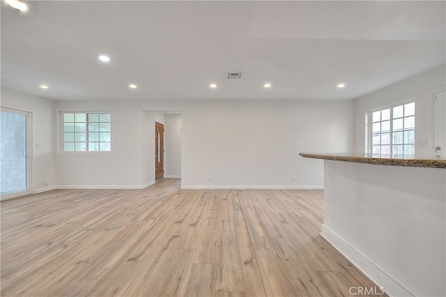 914 Lidford Ave, La Puente, CA 91744 - spare room with plenty of natural light, light wood finished floors, baseboards, and recessed lighting