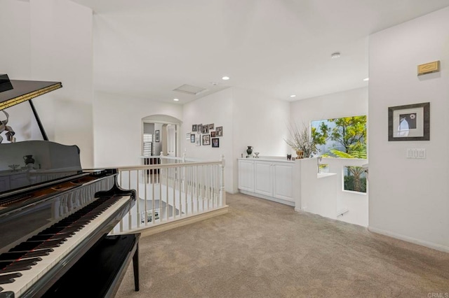 7256 Surfbird Cir, Carlsbad, CA 92011 - sitting room featuring an upstairs landing, carpet flooring, arched walkways, recessed lighting, and baseboards