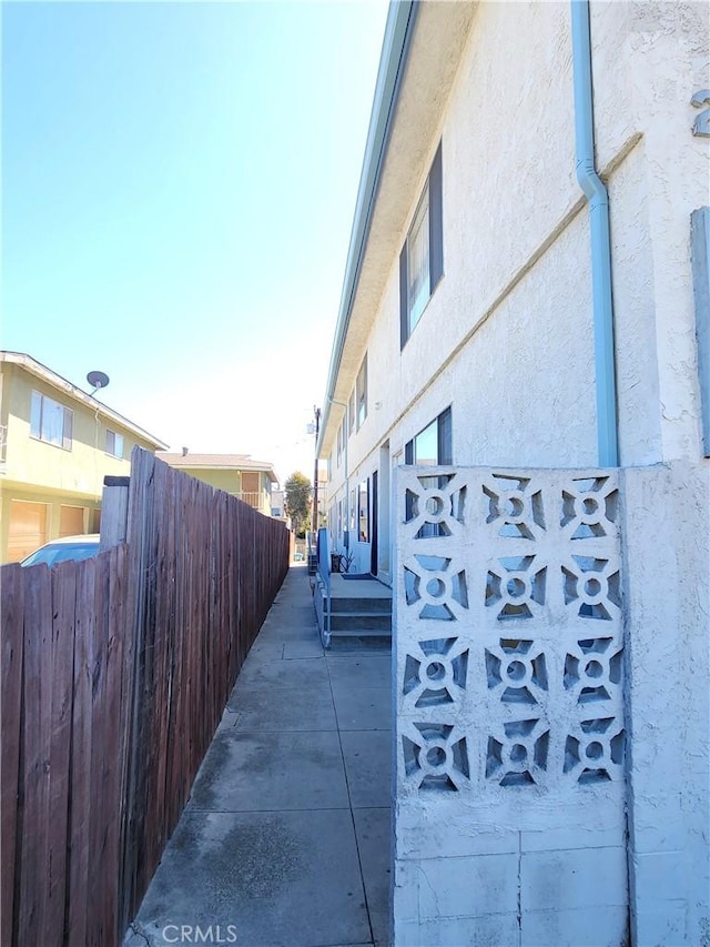 2616 Gates Ave, Redondo Beach, CA 90278 - view of property exterior with stucco siding and fence