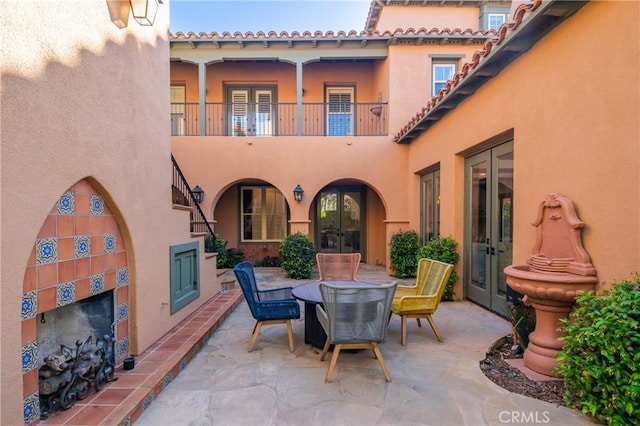7 Ocean Heights Dr, Newport Coast, CA 92657 - view of patio with french doors, outdoor dining space, and a balcony