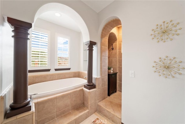 7 Ocean Heights Dr, Newport Coast, CA 92657 - full bath featuring tile patterned flooring, a bath, ornate columns, and tiled shower
