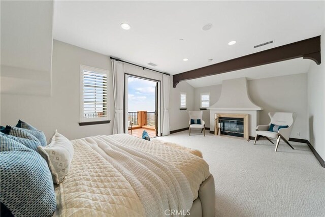 7 Ocean Heights Dr, Newport Coast, CA 92657 - bedroom with access to outside, baseboards, light colored carpet, recessed lighting, and a large fireplace