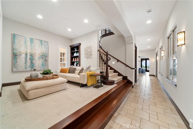 7 Ocean Heights Dr, Newport Coast, CA 92657 - living room featuring stairway, recessed lighting, baseboards, and arched walkways