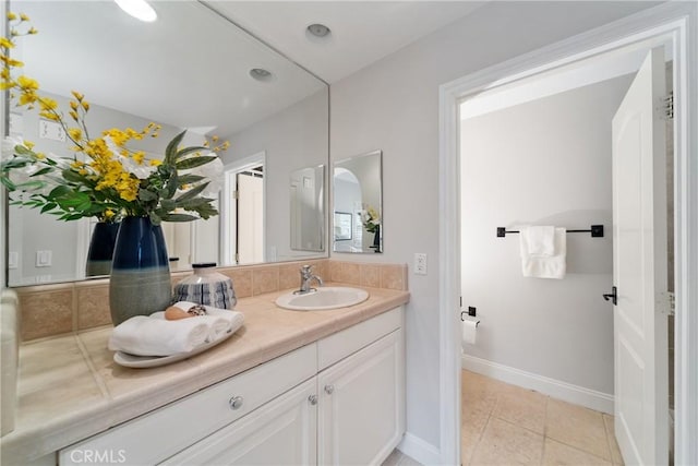 7 Ocean Heights Dr, Newport Coast, CA 92657 - bathroom featuring vanity, baseboards, and tile patterned flooring