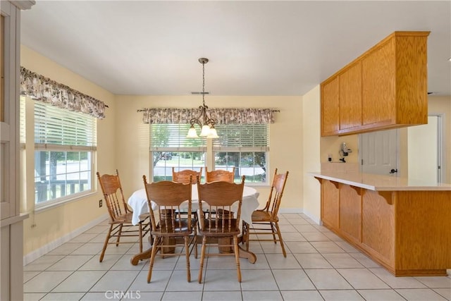 156 Greenfield Dr, Chico, CA 95973 - dining area with light tile patterned floors and baseboards