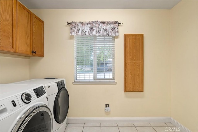 156 Greenfield Dr, Chico, CA 95973 - laundry area featuring cabinet space, independent washer and dryer, baseboards, and light tile patterned floors