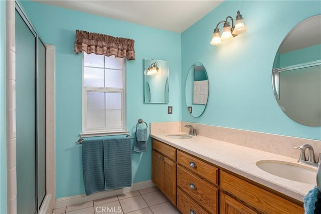 156 Greenfield Dr, Chico, CA 95973 - full bath with an enclosed shower, tile patterned floors, double vanity, and baseboards