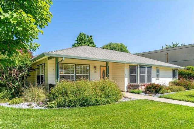 156 Greenfield Dr, Chico, CA 95973 - ranch-style house with a front yard and brick siding