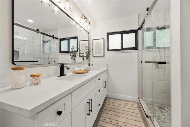 4732 Tucana St, Yorba Linda, CA 92886 - bathroom featuring a stall shower, double vanity, and baseboards