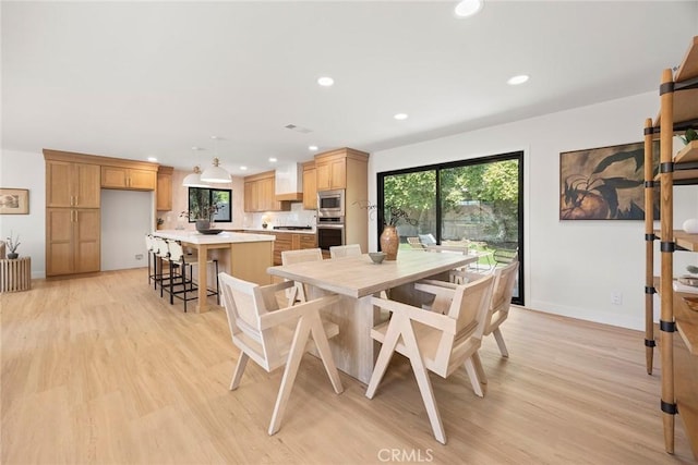 4732 Tucana St, Yorba Linda, CA 92886 - dining room with recessed lighting, light wood-style floors, and baseboards