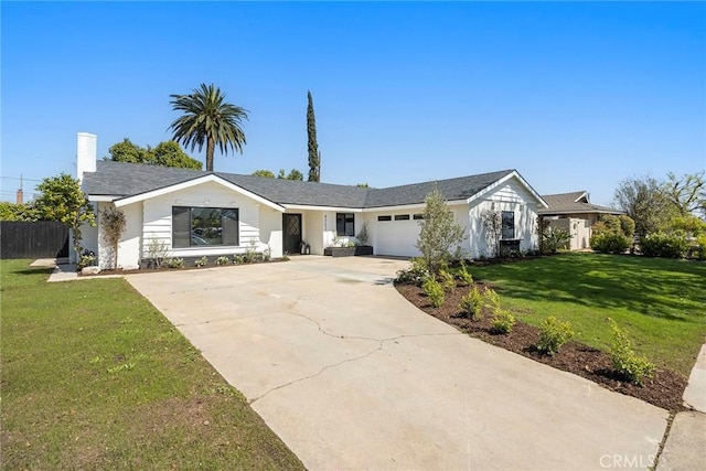 4732 Tucana St, Yorba Linda, CA 92886 - view of front of home featuring driveway, an attached garage, and a front lawn