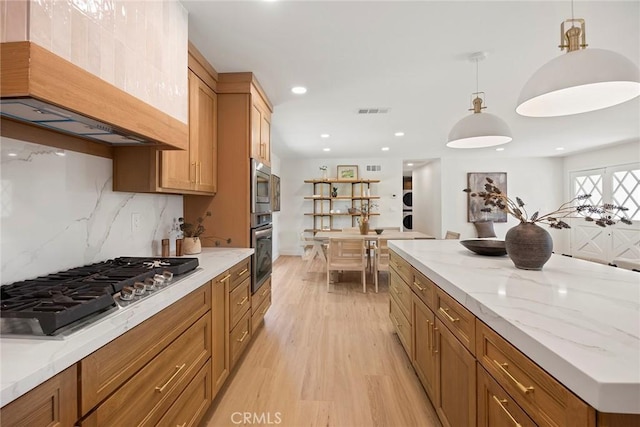 4732 Tucana St, Yorba Linda, CA 92886 - kitchen featuring stainless steel appliances, light wood-type flooring, decorative backsplash, pendant lighting, and light stone counters