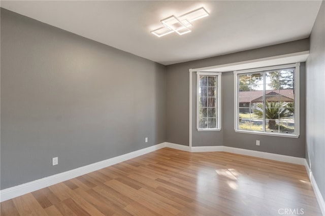 2505 Stuart Ave, Clovis, CA 93611 - spare room featuring light wood-style floors and baseboards