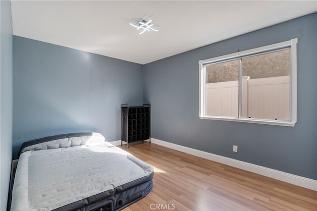 2505 Stuart Ave, Clovis, CA 93611 - bedroom with wood finished floors and baseboards