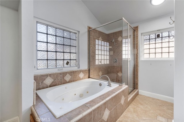 2505 Stuart Ave, Clovis, CA 93611 - bathroom featuring a stall shower, a tub with jets, tile patterned floors, baseboards, and lofted ceiling