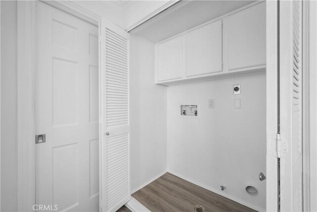 11954 Mayfield Ave Unit 3, Los Angeles, CA 90049 - laundry area featuring cabinet space, dark wood-type flooring, hookup for an electric dryer, washer hookup, and baseboards