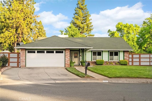 788 Marcia Ct, Chico, CA 95973 - ranch-style home with driveway, brick siding, an attached garage, and roof with shingles