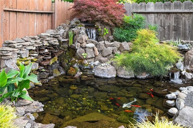 788 Marcia Ct, Chico, CA 95973 - view of yard with fence and a small pond