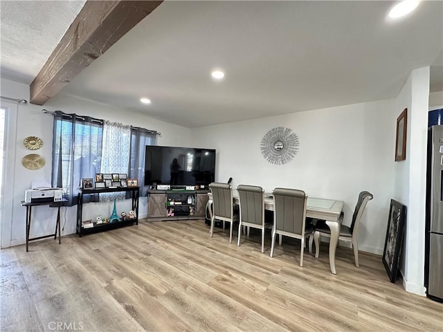 309 Santo Dr, San Jacinto, CA 92583 - dining space featuring wood finished floors, beamed ceiling, recessed lighting, and baseboards