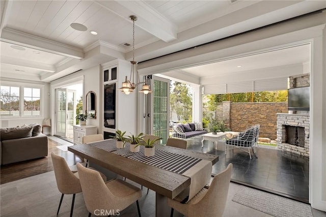 2711 Elm Ave, Manhattan Beach, CA 90266 - view of patio with an outdoor living space with a fireplace and outdoor dining area