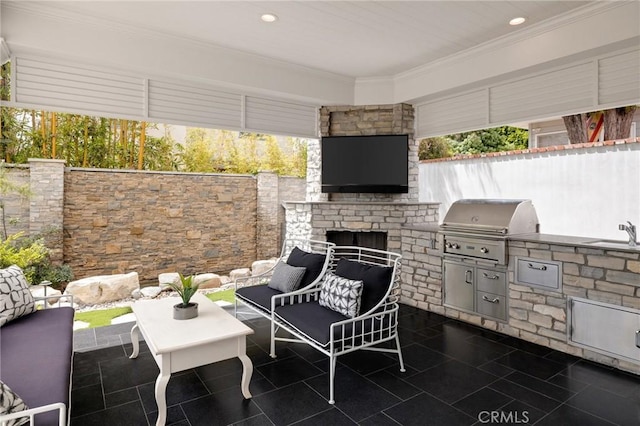 2711 Elm Ave, Manhattan Beach, CA 90266 - view of patio / terrace featuring a grill, exterior kitchen, an outdoor living space with a fireplace, a sink, and fence