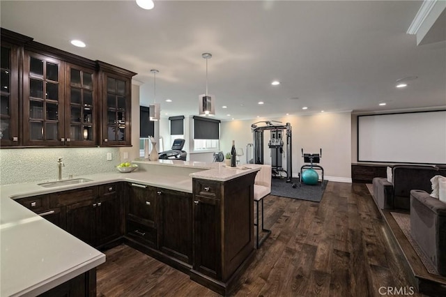 2711 Elm Ave, Manhattan Beach, CA 90266 - kitchen with open floor plan, a sink, light countertops, dark wood-style floors, and recessed lighting