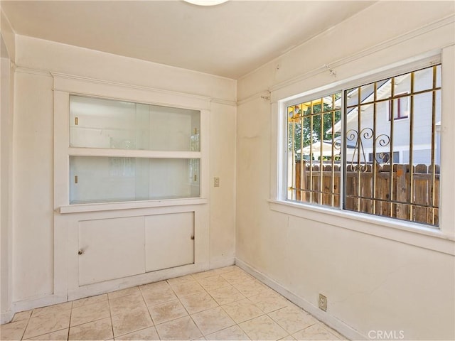 911 N Dos Robles Pl, Alhambra, CA 91801 - empty room with baseboards and tile patterned floors