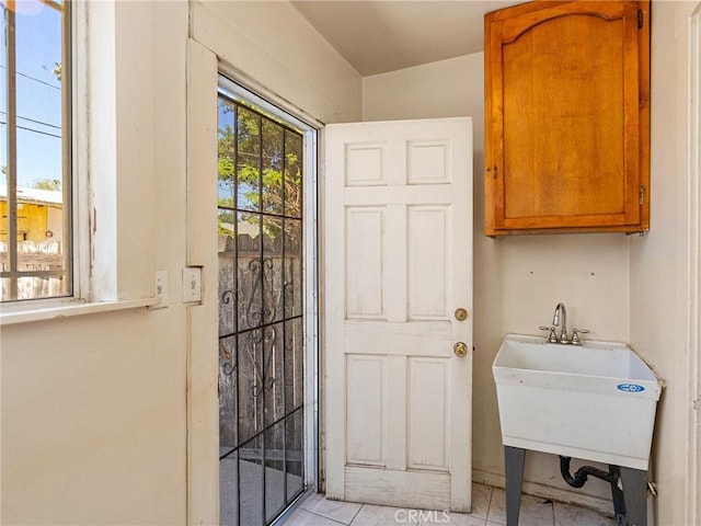 911 N Dos Robles Pl, Alhambra, CA 91801 - washroom featuring light tile patterned floors and a sink