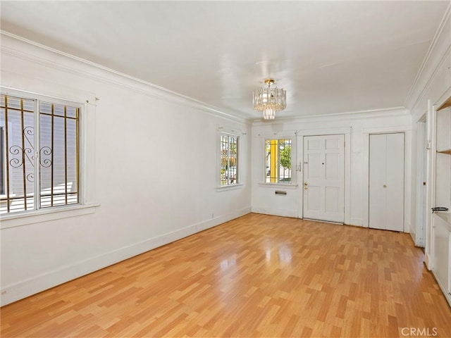 911 N Dos Robles Pl, Alhambra, CA 91801 - entryway with a chandelier, ornamental molding, wood finished floors, and baseboards