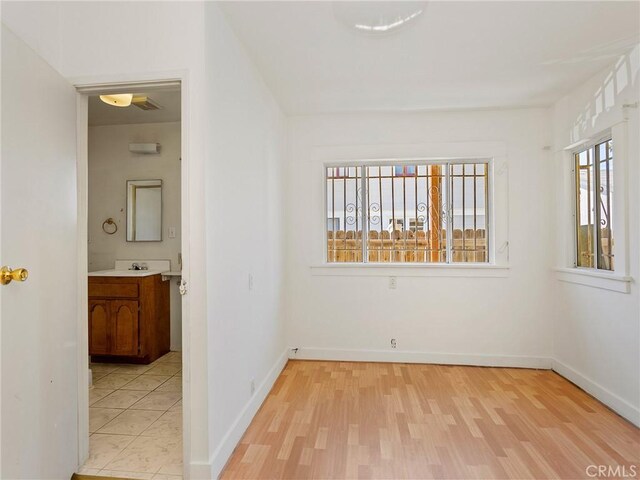 911 N Dos Robles Pl, Alhambra, CA 91801 - unfurnished room with light wood-style floors and baseboards