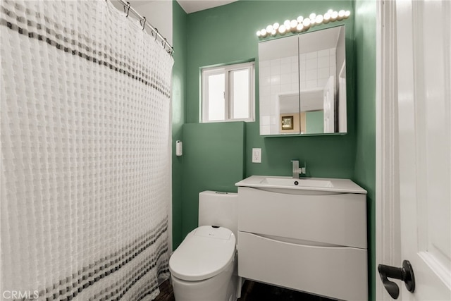 full bath with toilet and vanity