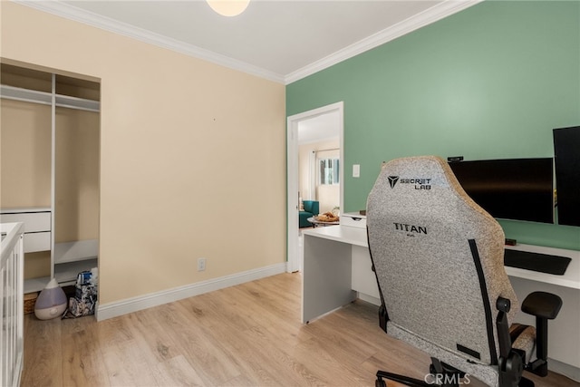 home office with crown molding, light wood finished floors, and baseboards