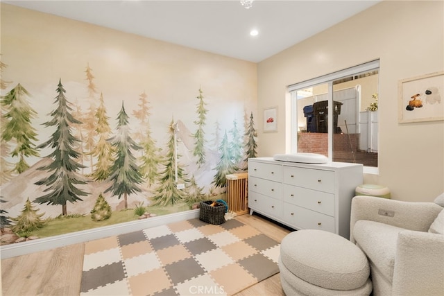 sitting room with recessed lighting and light wood-style floors