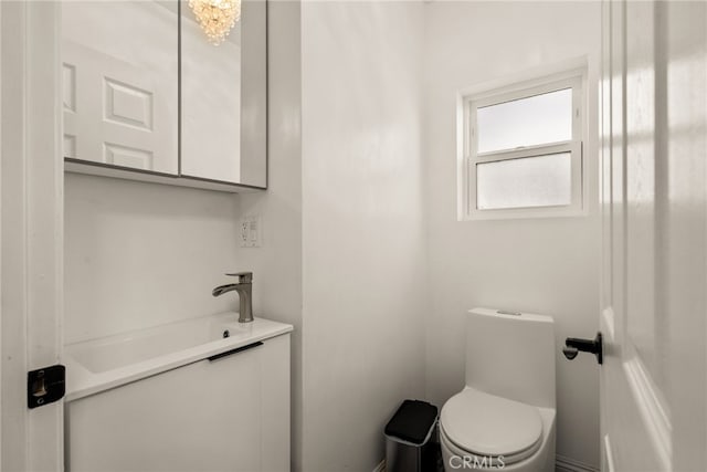 bathroom featuring toilet and a sink